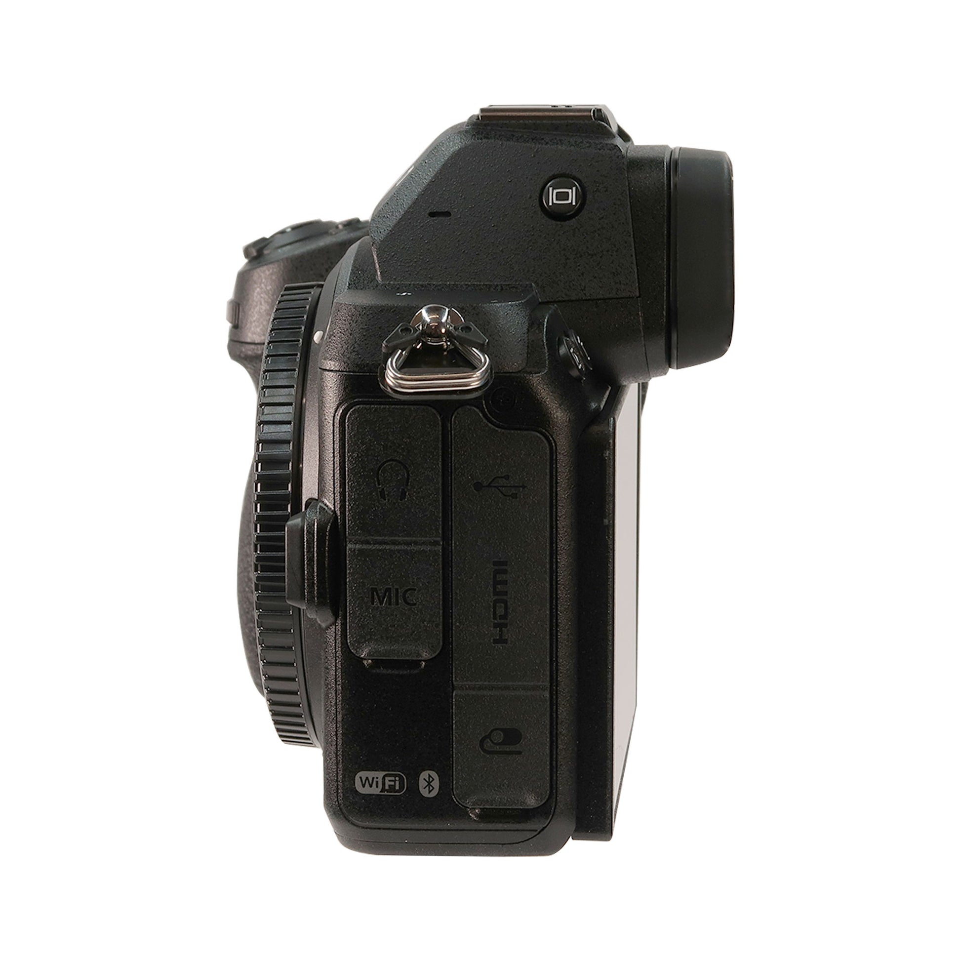 Side view of the Nikon Z 5 Mirrorless Digital Camera with AF-S NIKKOR 28mm f/1.8G Lens and F to Z Adapter Enhanced Macro Kit, featuring various ports, textured grip, WiFi/Bluetooth label, and support for 4K video recording.
