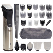 Philips grooming kit with trimmer, comb, and multiple attachments on a white background