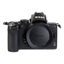 Nikon Z50 Mirrorless Digital Camera + Nikon NIKKOR Z 50mm f/1.4 Lens (Nikon Z Mount) + 64GB Memory Card + 62mm 3pc Filter Kit + Lens Cap Holder (x2) + Slave Flash + Professional Tripod